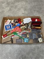 Assortment of vintage lighters, matches, shaving