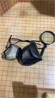 Binoculars case and magnifying glass