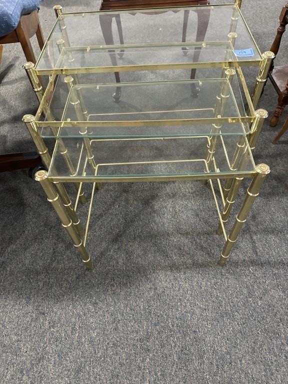 GLASS AND BRASS NEST OF TABLES