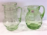 Pair of Lg. Green Depression Pitchers