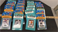 24 Packs of Unopened Hockey Cards.