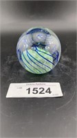 Blue and green paper weight