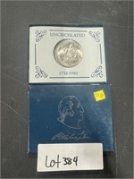 UNCIRCULATED HALF SILVER DOLLAR