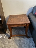 End table with decorative nail heads