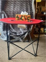 C5) Easy to carry, lightweight travel table. Has 4