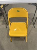 Yellow folding chair