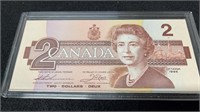 Uncirculated 1986 Canadian 2 Dollar Bill In Hard P