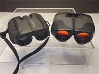 Two pairs of compact binoculars