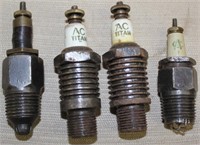 (4) spark plugs, (2) AC TITAN (1) AC, (1) unmarked