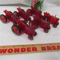 6 Farmall miniature plastic tractors