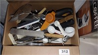 box of cooking utensils