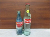 2 Coca Cola Bottles - 2001 & 1 with Candle