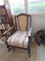 ARMED ROCKING CHAIR CUSHIONED CANE BACK