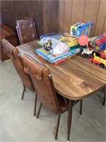 Table with 3 chairs (games not included)