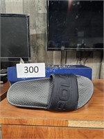 men’s polo black slides size 9D (lobby area)