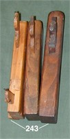 Three wooden molding planes