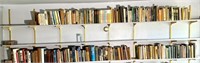(2) long shelves of books including Jane Austen;