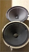 Two large speakers one marked Vox design for
