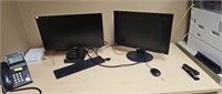 2 monitors a keyboard and a computer with no hard