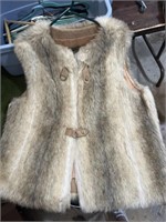 2 fur vest and 1 fur coat size large.