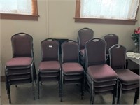 26 stacking padded chairs