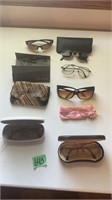 Assorted glasses and sun glasses