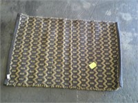 small woven rug