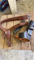 To vintage leather gun, holsters belts, one black