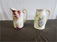 Two Floral Design Pitchers