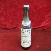 Very old Tribuno vermouth booze bottle.