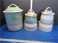 UNUSUAL POTTERY SIGNED CANNISTER SET