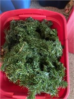 Two totes of Christmas greenery