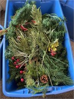 Two totes of Christmas greenery