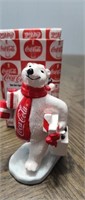 1997 Coca-Cola bear figurine carring presents