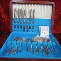 Silver plate flatware set in box.