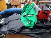 Various duffle bags and tool cases