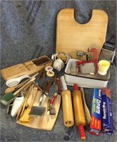 Kitchen utensils, cutting board, cheese grater,