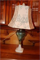 Blue lamp with milk glass base decorated with
