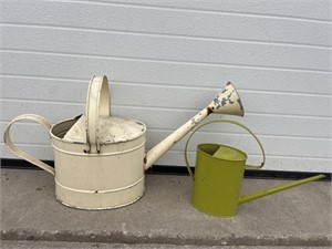 2 metal watering cans