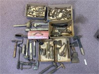 Large selection of antique wrenches, hammers,