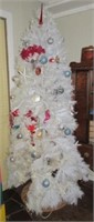 7' Christmas tree with ornaments.