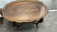 Antique oval  tea table with cornucopia carved