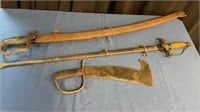 2 antique swords and a machete