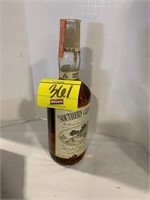 TAX TAG SEALED BOTTLE OF SOUTHERN COMFORT