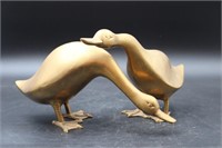PAIR OF BRASS GEESE IN DIFFERENT POSITIONS
