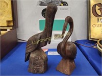 PAIR OF CARVED WOODEN STORKS