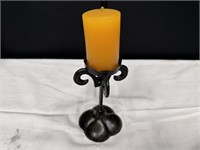 brass colored candle stick