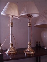 Pair of brass and white stick lamps with white