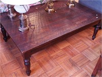 Table with turned legs and thick wood top,