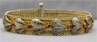 Bracelet with Gold wash and gemstones.